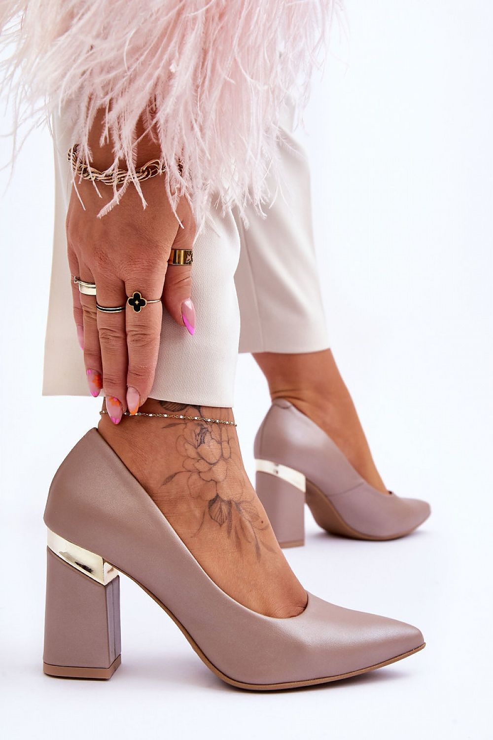 beige block heel pumps detail view