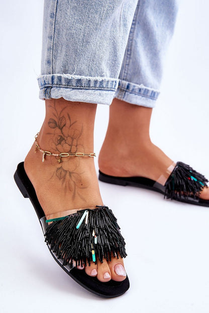 black flip-flops detail view