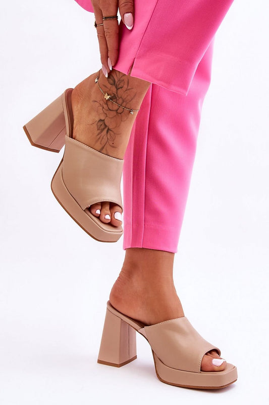 beige flip-flops front view