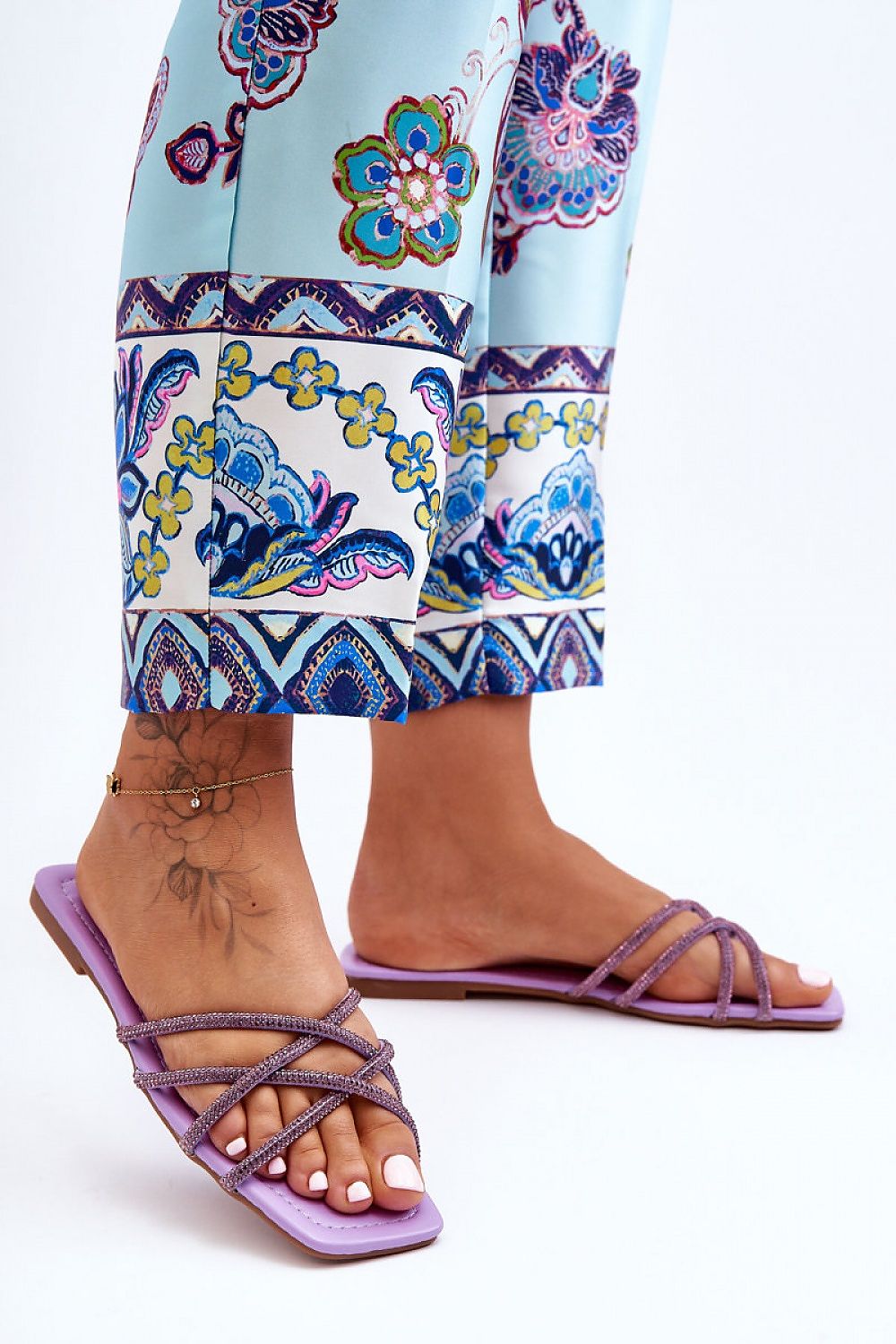 violet flip-flops detail view