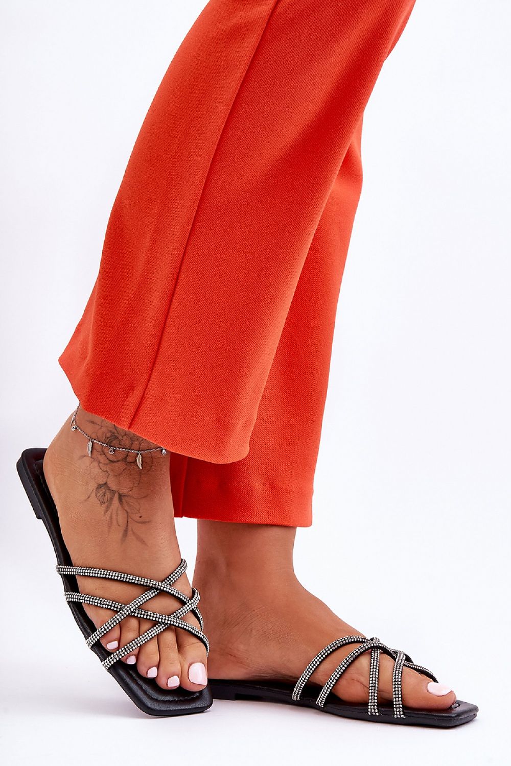 violet flip-flops back view