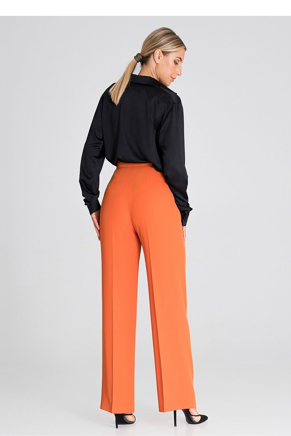 orange trousers detail view